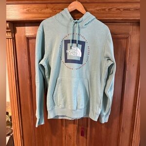 The North Face front logo-Never Stop Exploring- 
Green Hoodie size M